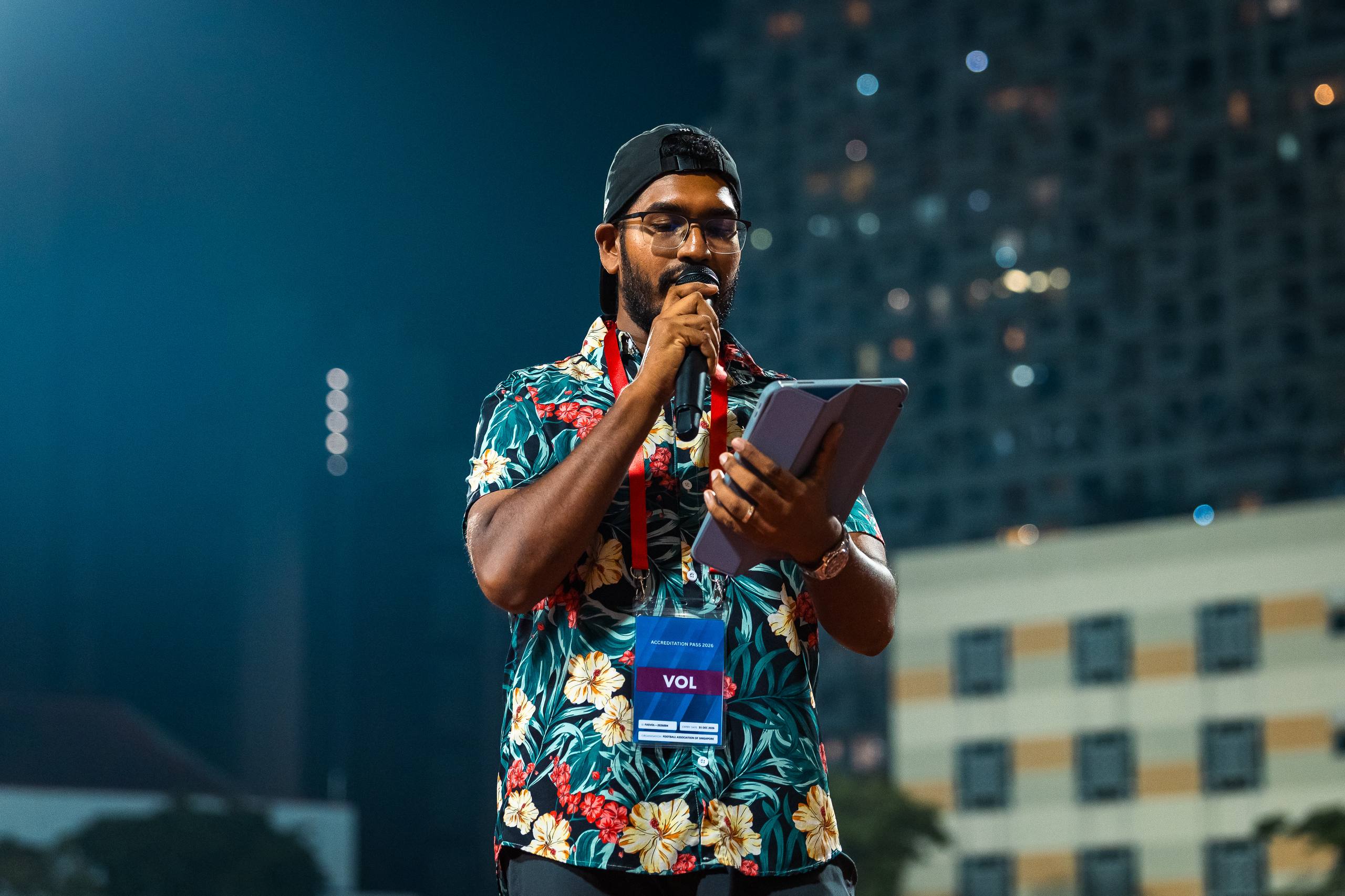 Mazeen Muneez emceeing an event