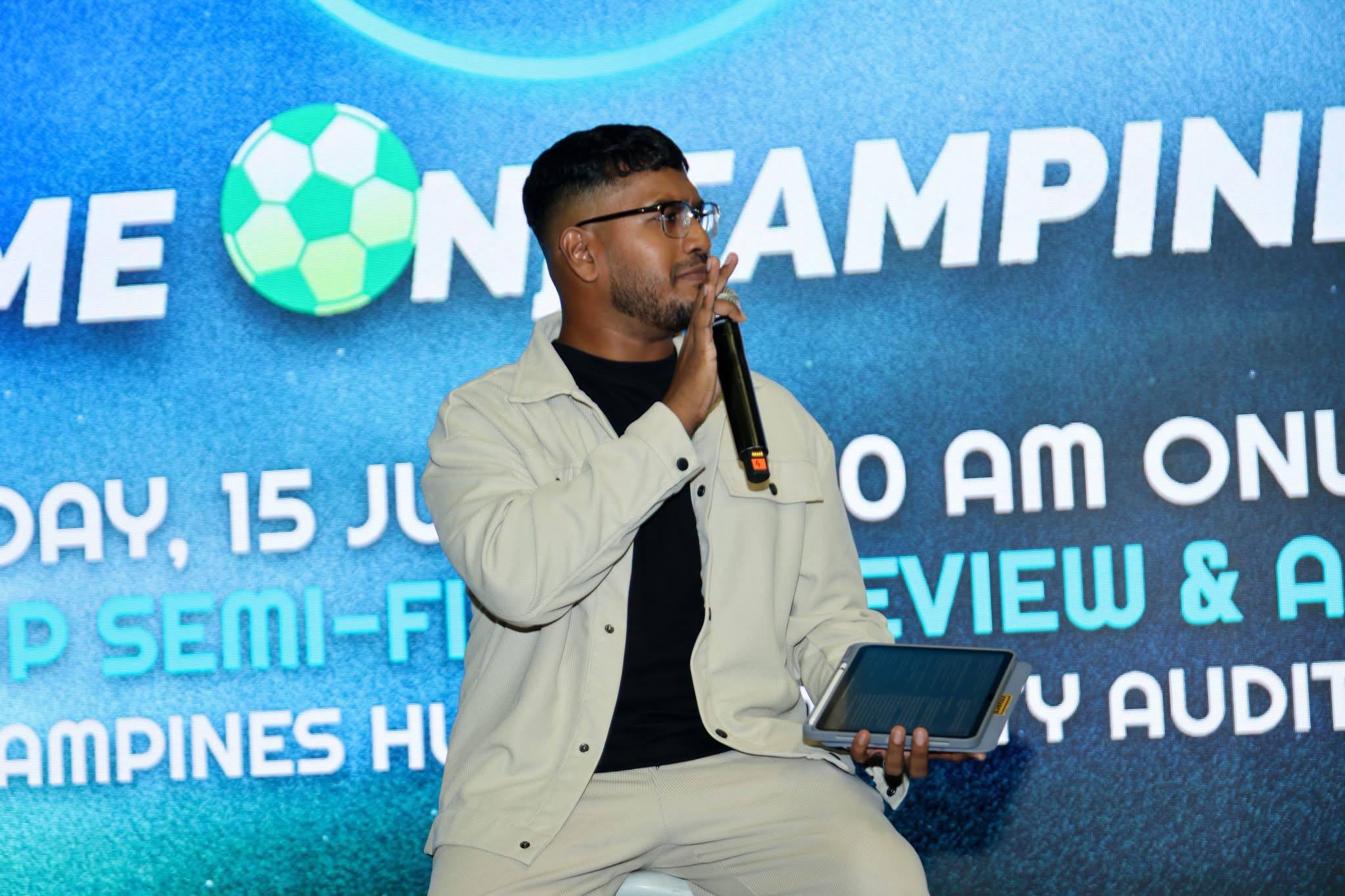 Mazeen Muneez emceeing an event